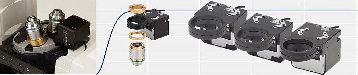 顕微鏡の対物レンズターレットに装着された圧電駆動オートフォーカスステージ。共焦点・蛍光顕微鏡用のサイレント・低振動ナノメートル位置決めを提供するPIFOCスタイルのZ焦点機構