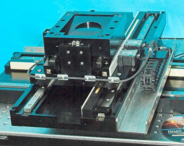 Wafer inspection stage designed for constant-velocity scanning applications